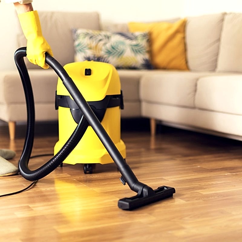 woman-cleaning-sofa-with-yellow-vacuum-cleaner-copy-space-cleaning-service-concept.jpg